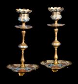 ‡ A pair of French gilt metal and champlevé enamel candlesticks in the Orientalist taste