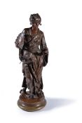 Vincent Desiré Faure de Broussé (French, 19th century), a patinated bronze model of a standing geish