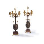 ‡ A pair of parcel gilt & patinated bronze and marble six light candelabra by Ferdinand Barbedienne