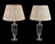 A pair of metal mounted glass urn table lamps