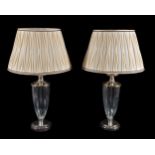 A pair of metal mounted glass urn table lamps