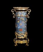 ‡ A substantial French patinated & parcel gilt bronze mounted ceramic vase in the Chinoiserie taste