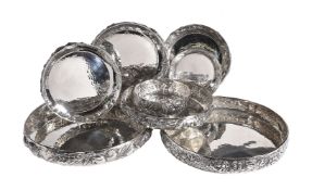 A graduated suite of four pairs of Italian silver coloured bowls by Brandimarte