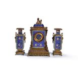 ‡ A French metal cloisonné enamel clock garniture in Chinese taste