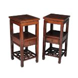 A pair of Chinese hardwood two tier tables