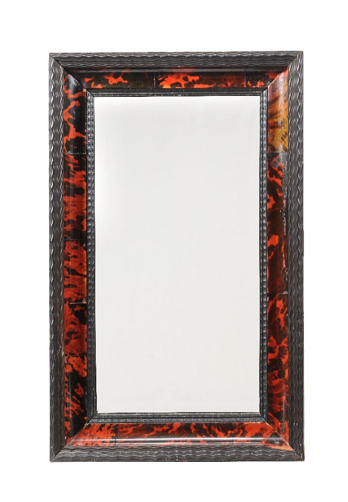 ϒ A small Flemish tortoiseshell and ebonised frame now as a wall mirror