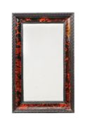 ϒ A small Flemish tortoiseshell and ebonised frame now as a wall mirror