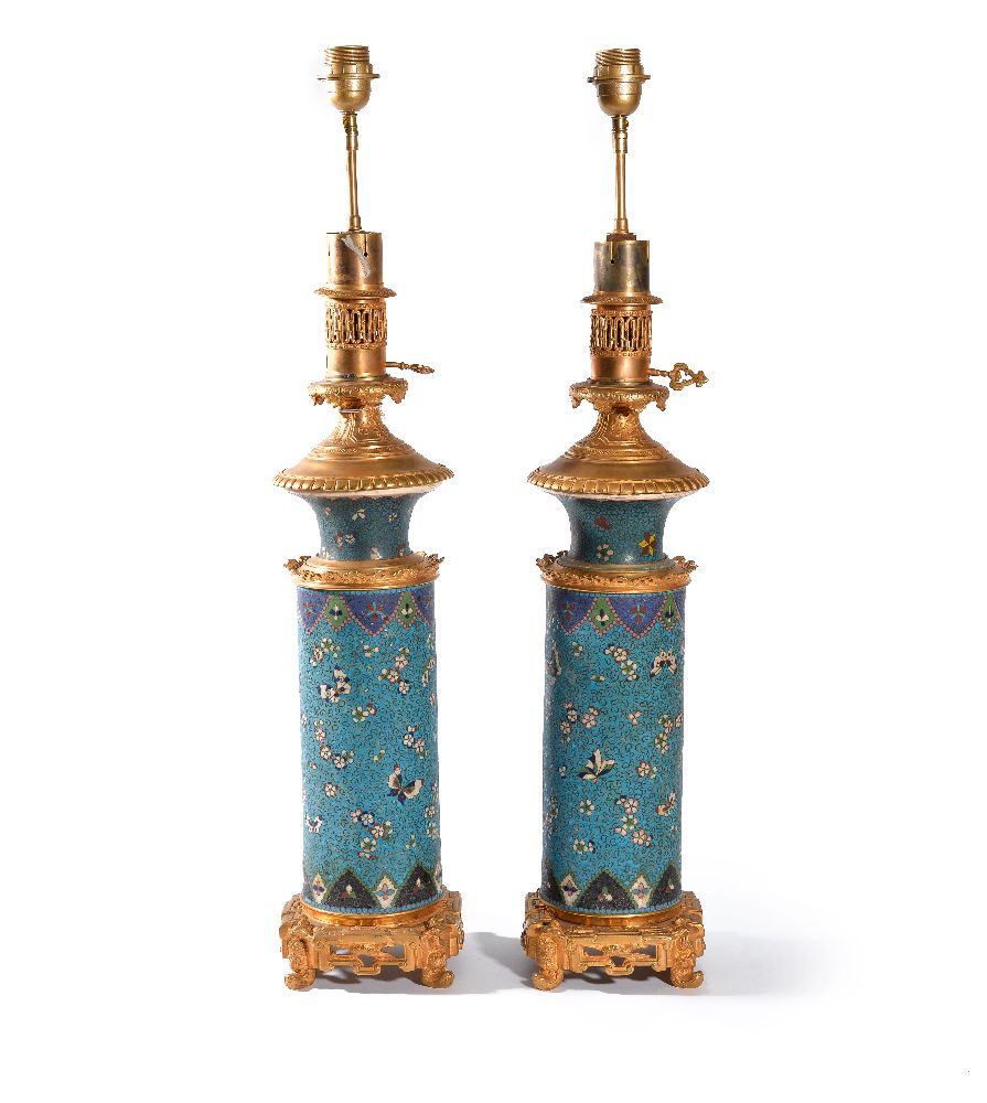 A pair of gilt metal mounted ceramic oil table lamps in the Japonisme taste