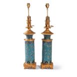 A pair of gilt metal mounted ceramic oil table lamps in the Japonisme taste