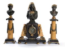 ‡ A French patinated and parcel gilt bronze and marble mounted clock garniture in Egyptian revival