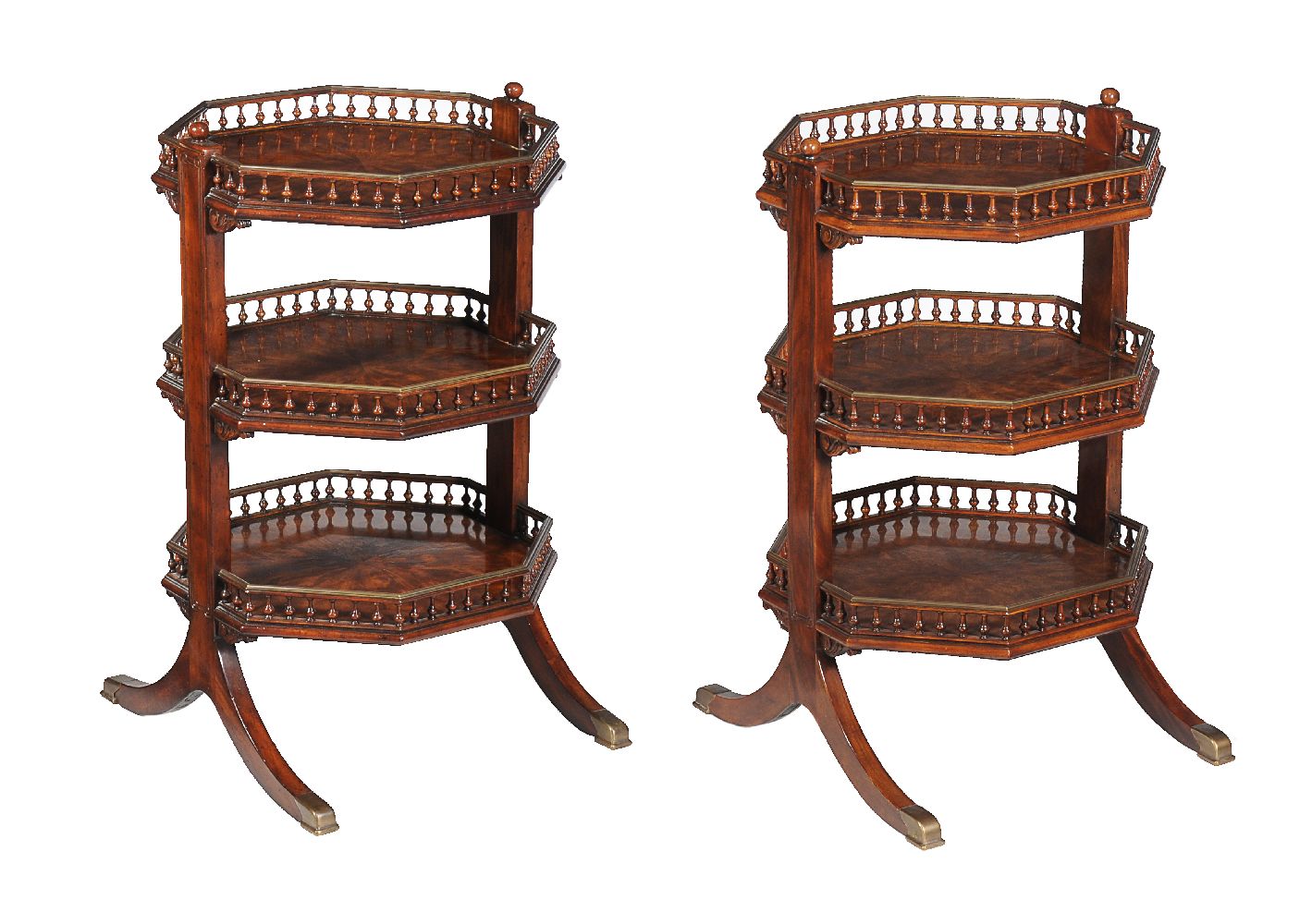 A set of four mahogany and brass mounted octagonal three tier étagères