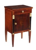 A companion pair of cherry wood and ebonised bedside tables in Louis Philippe style