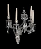 A pair of cut and moulded glass four light wall appliques