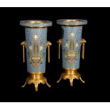 ‡ A pair of French gilt bronze and champlevé enamel vases by Ferdinand Barbedienne