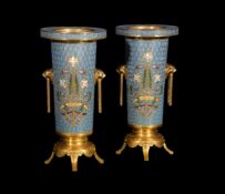 ‡ A pair of French gilt bronze and champlevé enamel vases by Ferdinand Barbedienne