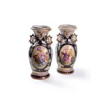 ‡ A pair of French pottery two handled Chinoiserie vases