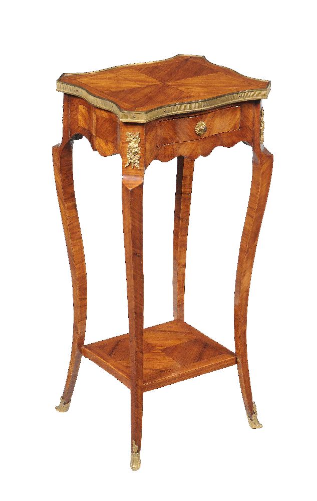 ϒ A French kingwood and gilt metal mounted bedside/lamp table