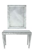 A mirrored glass console table