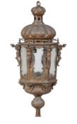 An Italian repousse sheet metal and glazed hexagonal pole lantern in Baroque taste