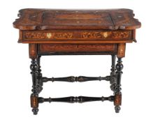 An Italian walnut and marquetry inlaid writing table