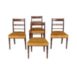 A set of nine Regency mahogany dining chairs