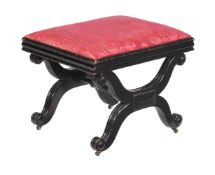 A Regency ebonised X-frame stool
