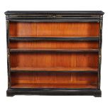 An Aesthetic Movement ebonised and parcel gilt open bookcase