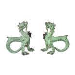 A pair of green painted cast iron boot scrapes in Chinese taste