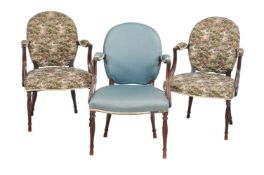 A set of three George III mahogany armchairs
