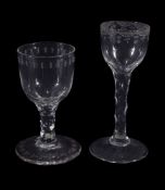 Two various facet stemmed wine glasses