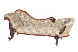 A Victorian carved walnut chaise longue