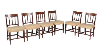 A set of eight George III mahogany and inlaid dining chairs