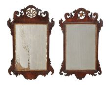 Two similar George III mahogany fretwork wall mirrors