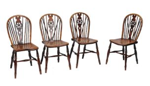 A set of four ash and elm Windsor chairs