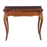 ϒ A rosewood card table in Louis XVI style