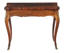 ϒ A rosewood card table in Louis XVI style