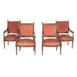 A set of four beech and upholstered armchairs in Louis XVI style