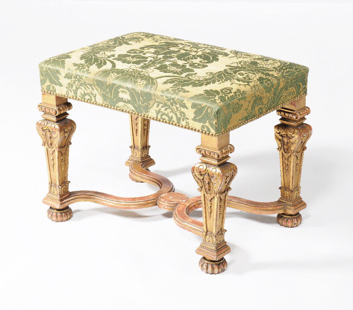 A carved giltwood stool