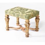 A carved giltwood stool