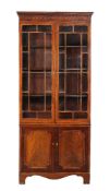 ϒ A George III mahogany and tulipwood banded cabinet