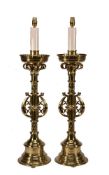 A pair of substantial Victorian gilt brass table lamps