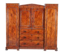 An early Victorian mahogany compactum wardrobe