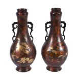 A Pair of Japanese Bronze Vases each of ovoid form on a splayed foot with s tapering neck rising to