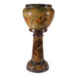 A Doulton Lambeth 'Autumn Foliage' salt glaze stoneware jardinière and stand