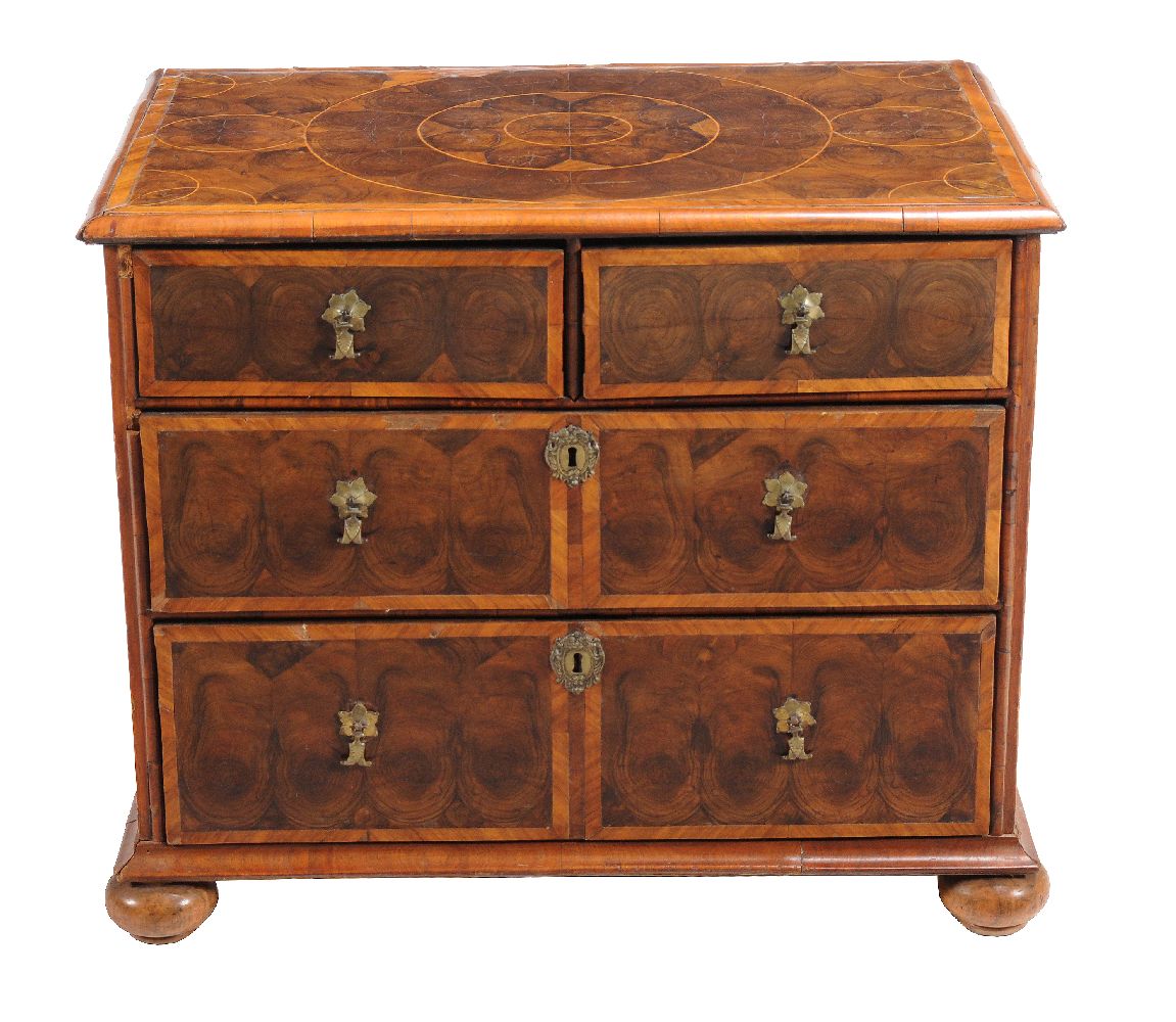 A William and Mary oyster veneered chest of drawers