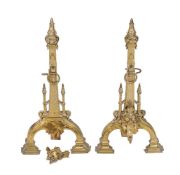 A pair of late Victorian gilt brass andirons