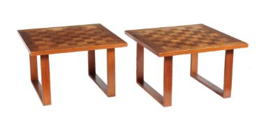 A pair of teak low occasional tables