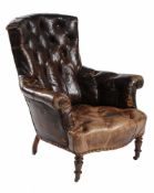 A Victorian mahogany and buttoned leather upholstered armchair