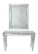 A mirrored glass console table