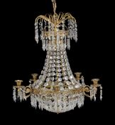 A gilt brass and cut glass five light cage chandelier in Louis XV taste